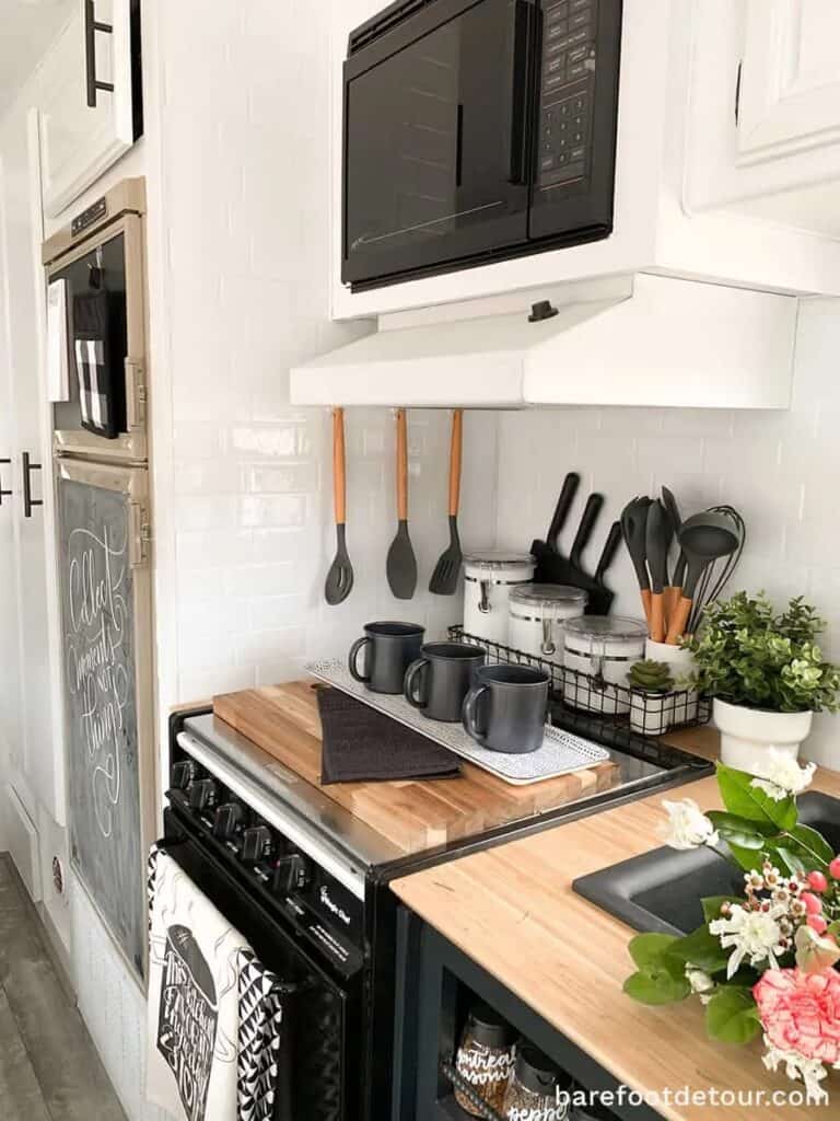 rv kitchen with subway tile by barefootdetour