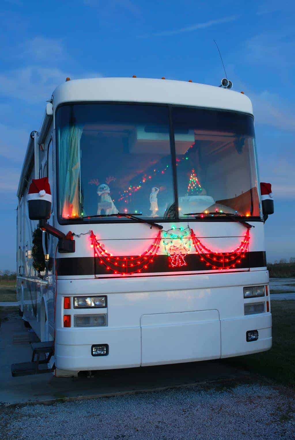 Red Christmas decorations all over an RV