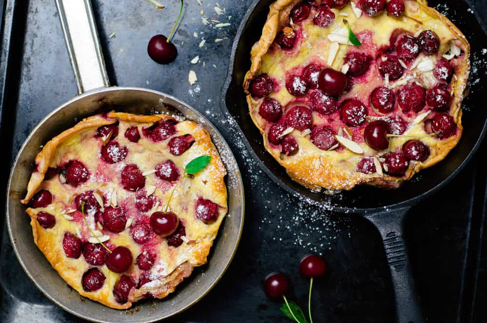 Dutch Oven Desserts with red berries on top