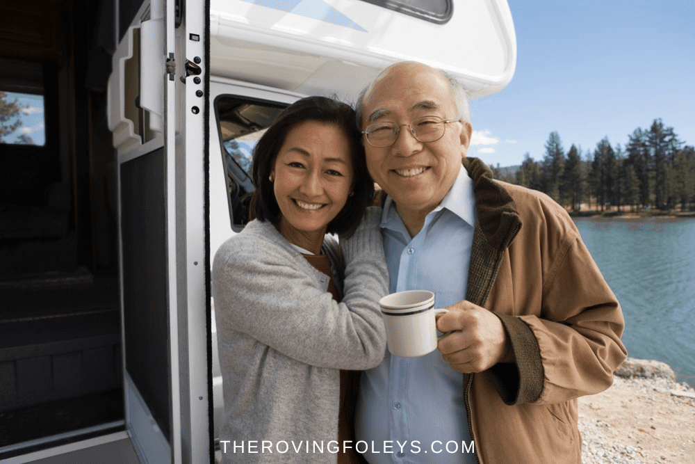 asian couple with coffee and rv