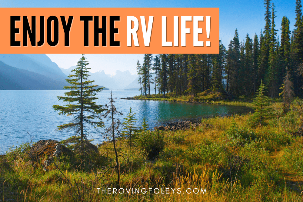 woods and lake with enjoy the rv life