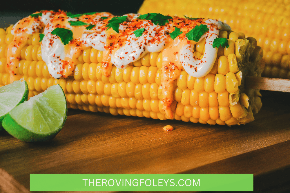 corn cobs with mayo and cheese