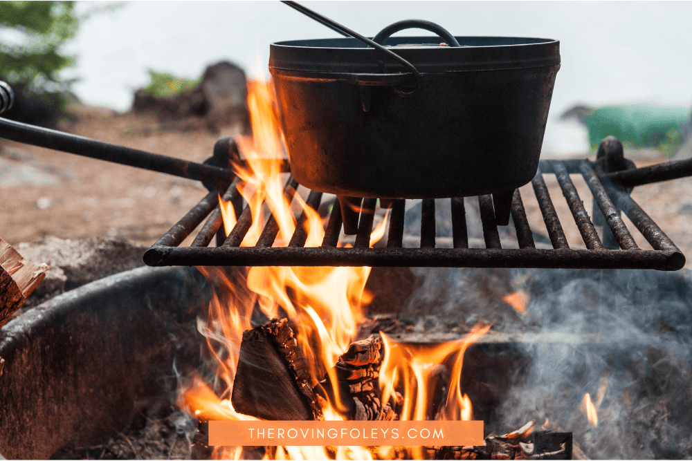 Dutch oven of camping stew on a fire