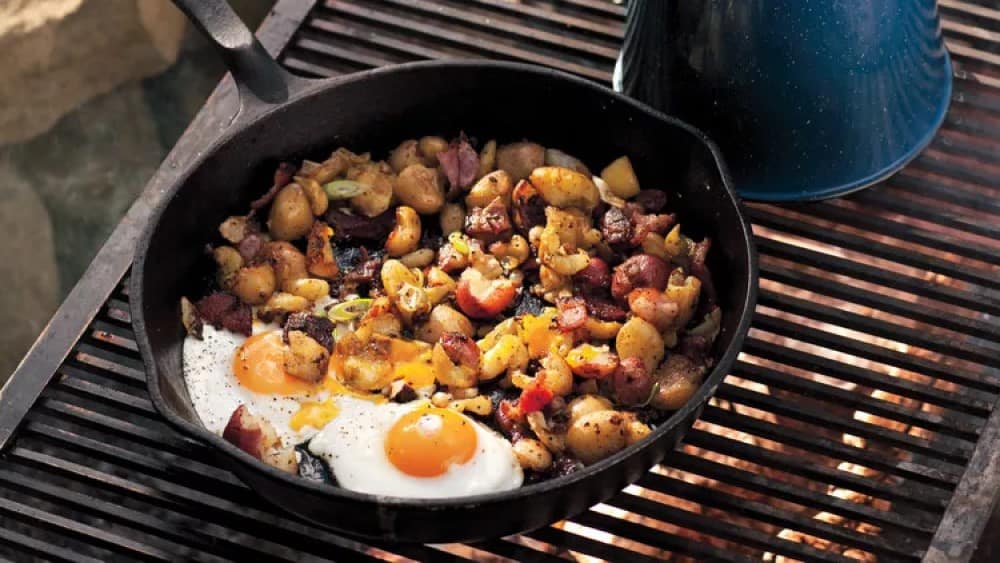 Campfire Fried Eggs With Potatoes and Bacon Hash
